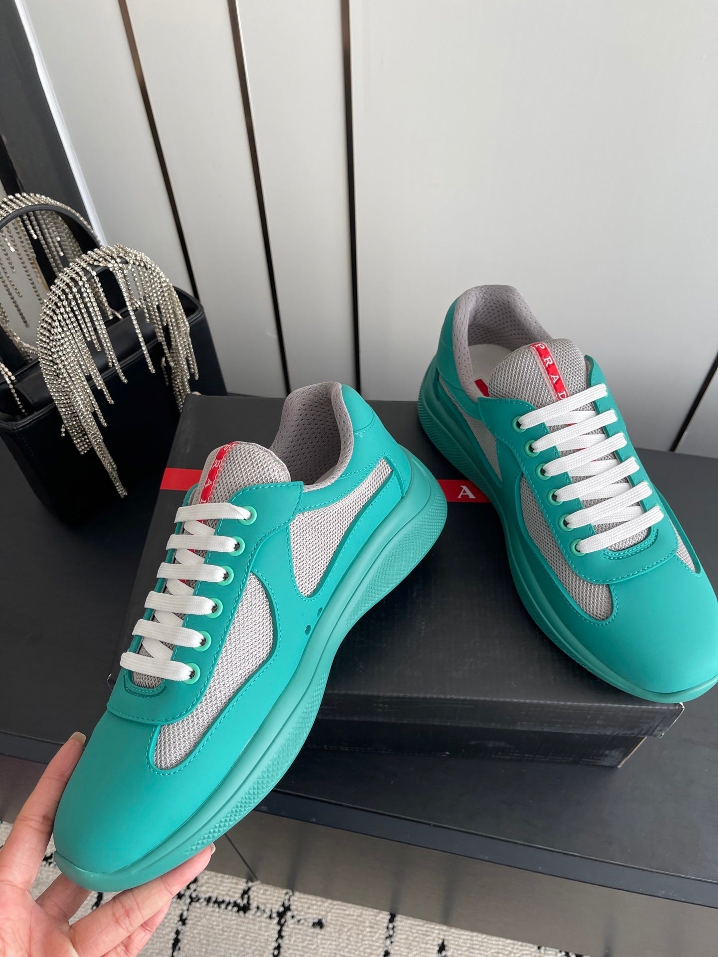 PRADA 26S AMERICA CUP SNEAKERS IN TEAL BLUE SOFT RUBBER AND BIKE FABRIC