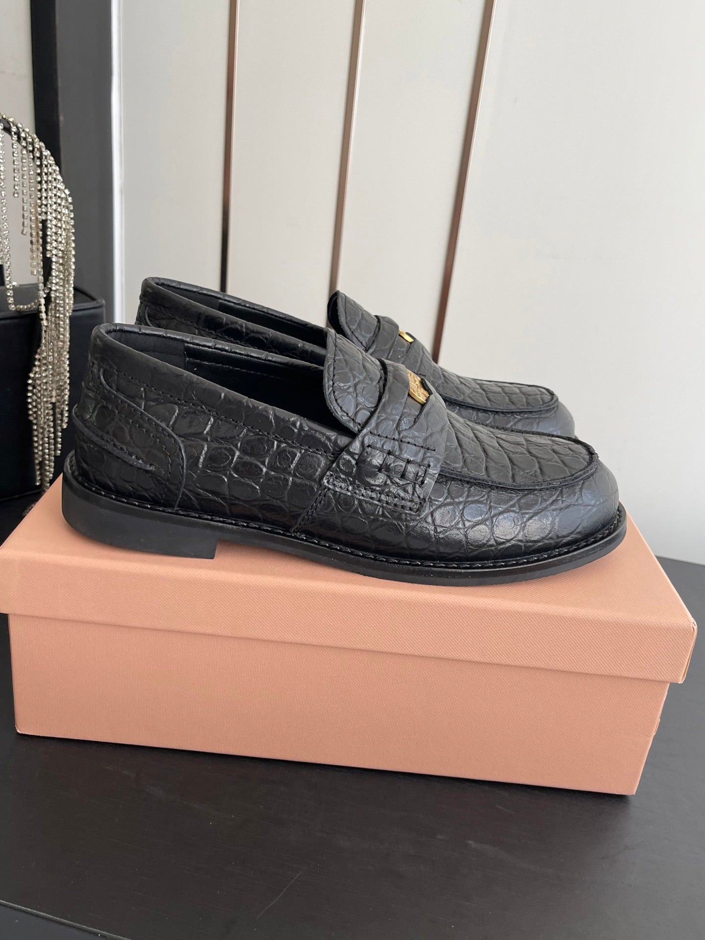 MIUMIU 26S PENNY LOAFERS IN BLACK CALFSKIN CROCODILE EMBOSSING
