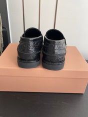 MIUMIU 26S PENNY LOAFERS IN BLACK CALFSKIN CROCODILE EMBOSSING