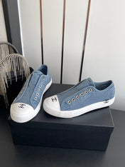 CHANEL 26S LOW TOP SNEAKERS IN NAVY BLUE CANVAS