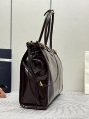 PRADA 25S BONNIE EXTRA-LARGE 42 IN DARK BROWN GLOSSY CALFSKIN GOLD HARDWRE
