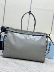 PRADA 25S LUX SOFT BAG 42 IN GRAY GLOSSY CALFSKIN GOLD HARDWRE