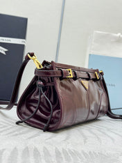 PRADA 25S BONNIE SMALL SHOULDER BAG 26 IN BURGUNDY GLOSSY CALFSKIN GOLD HARDWRE