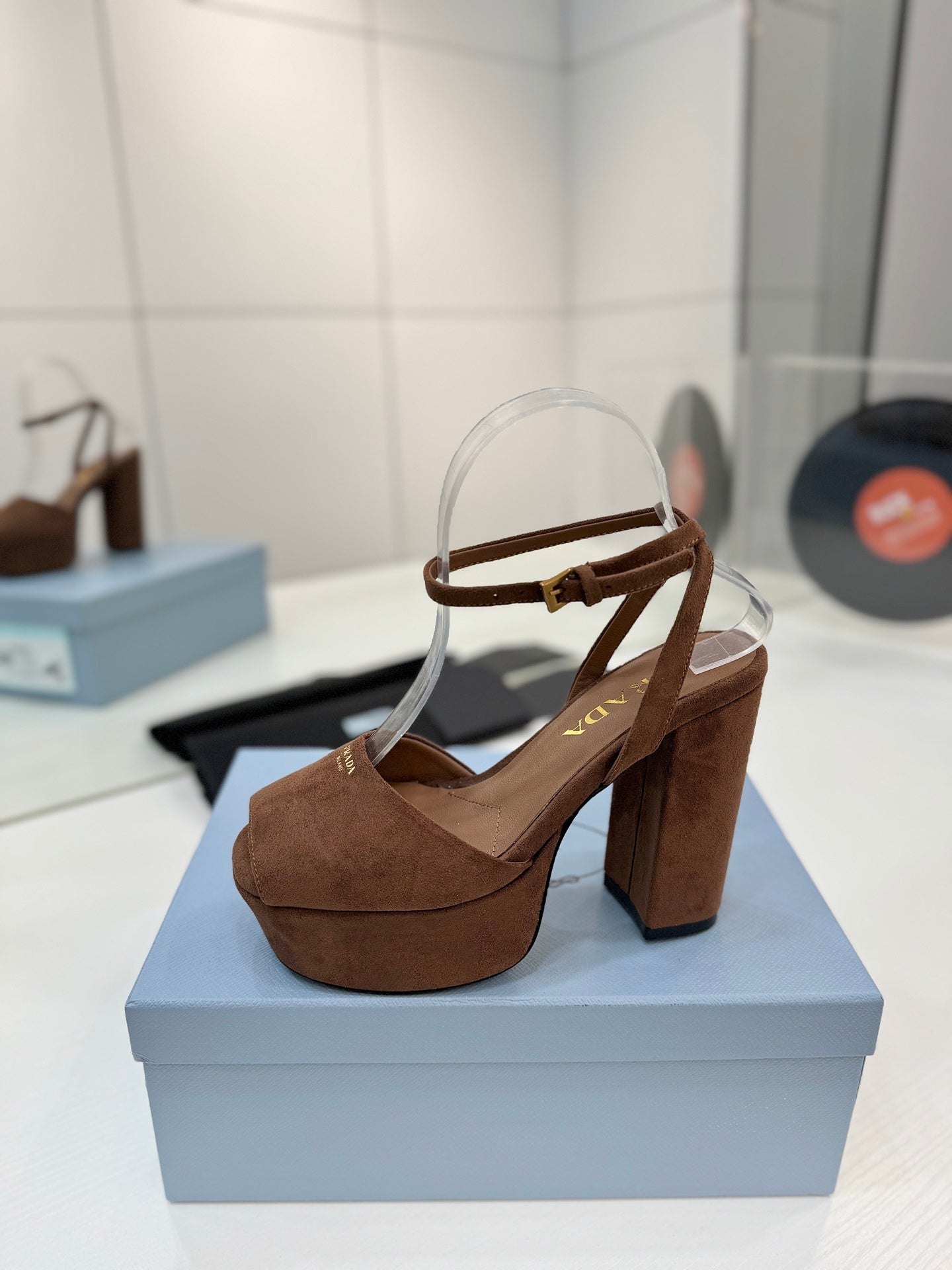 PRADA 26S HEELED SANDALS 115MM IN DARK BROWN SUEDE