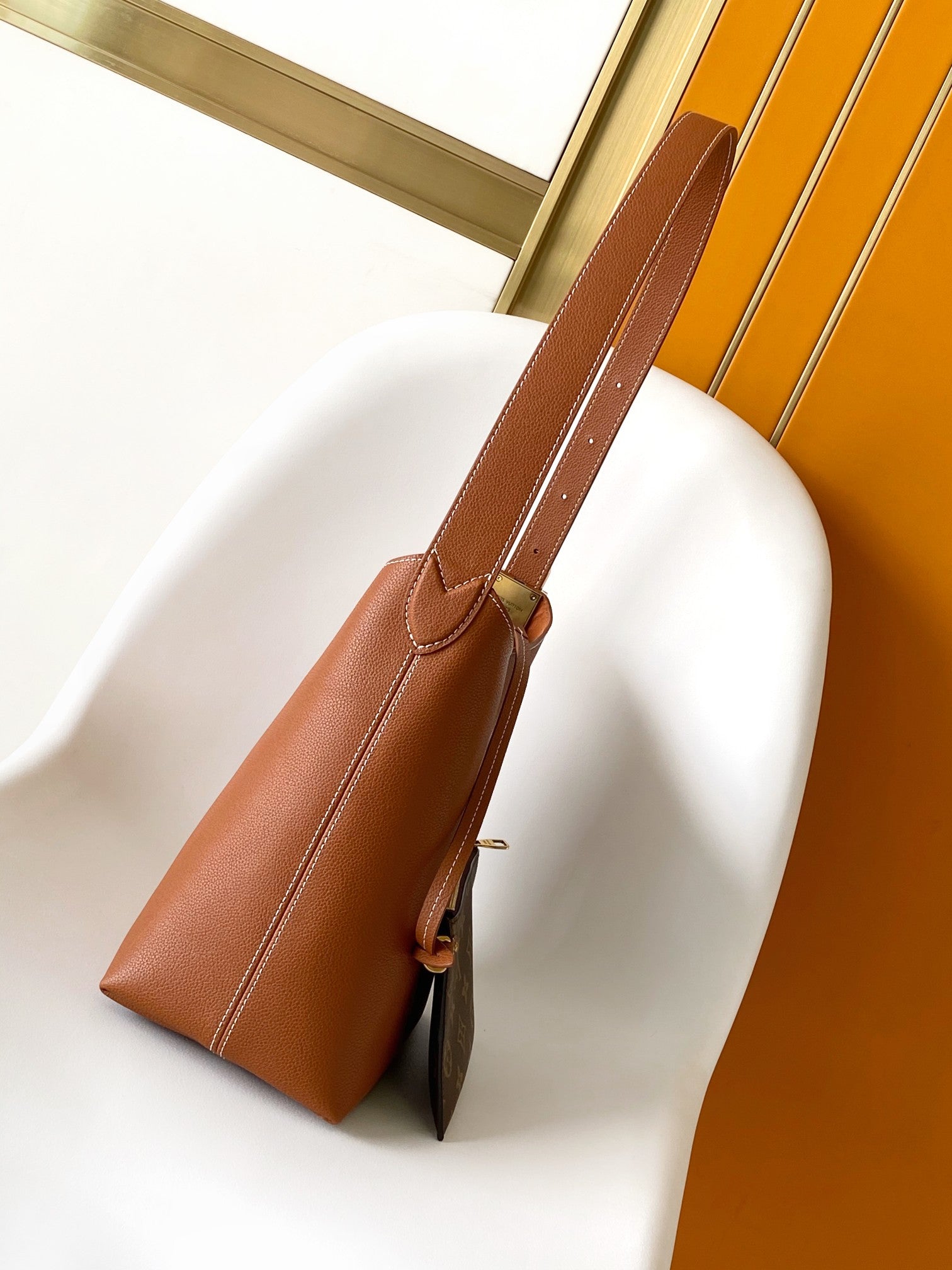 LV 25S LOW KEY HOBO BAG 35 CM IN BURNT ORANGE CALFSKIN