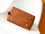 LV 25S LOW KEY HOBO BAG 35 CM IN BURNT ORANGE CALFSKIN