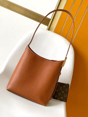 LV 25S LOW KEY HOBO BAG 35 CM IN BURNT ORANGE CALFSKIN