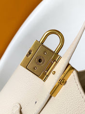 LV 25S LOW KEY HOBO BAG 28 CM IN CREAM WHITE CALFSKIN