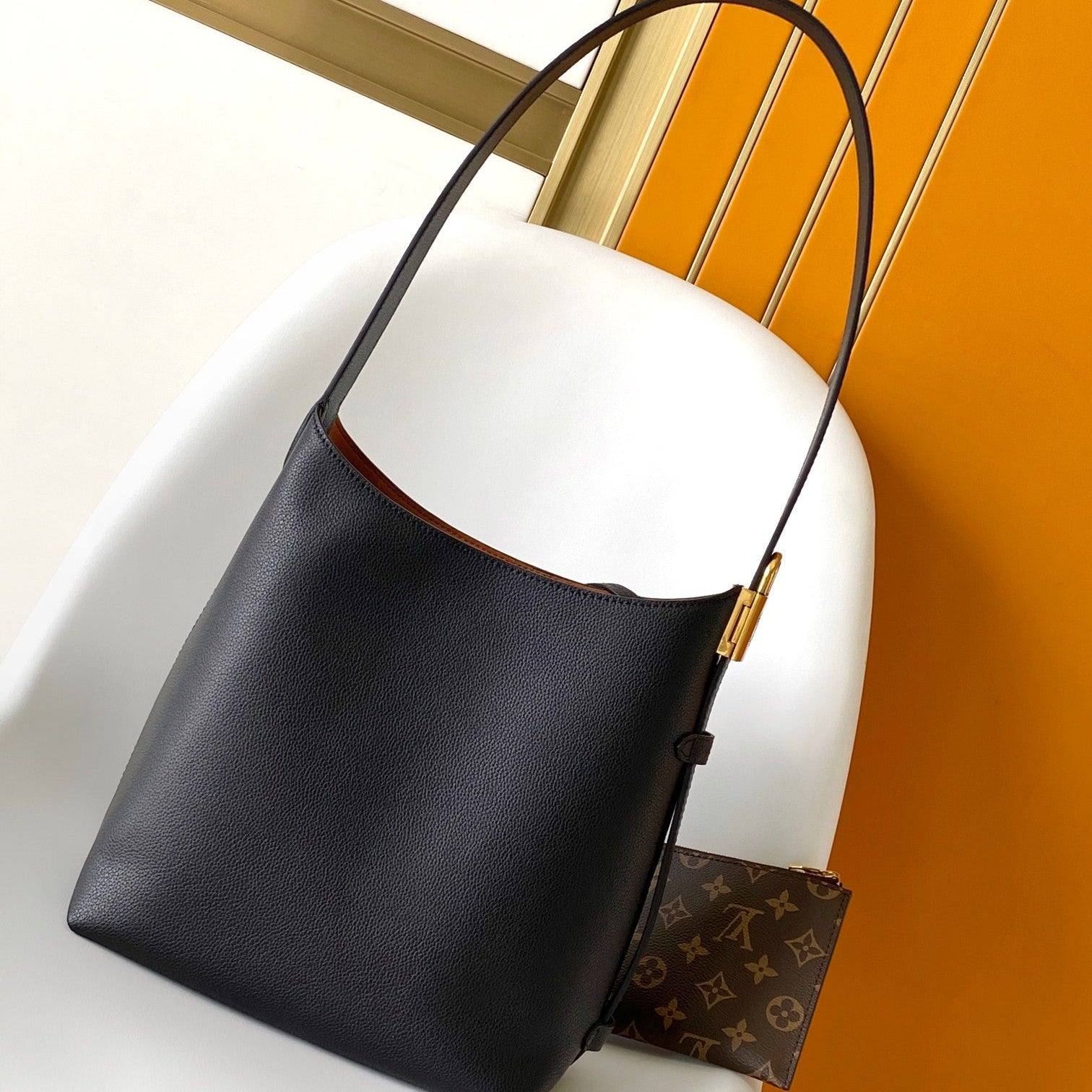 LV 25S LOW KEY HOBO BAG 35 CM IN BLACK CALFSKIN