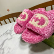 INTERLOCKING G SLIDE SANDAL IN PINK LAMB WOOL