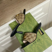GUCCI 26S HEELED SLIDES 75 MM IN SAND BROWN CANVAS AND BLACK LAMBSKIN