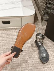 ALAIA SANDAL IN BLACK CALFSKN AND FILM WITH CRYSTAL