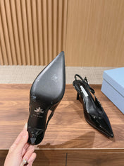 PRADA 26S SLINGBACK PUMPS IN BLACK PATENT CALFSKIN