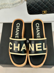 THICK SOLE LETTER SLIPPERS IN BLACK SHEEPSKIN