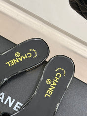 CC SLIDE SANDALS IN BLACK AND WHITE PEARL