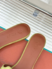FLAT SANDALS IN MOSS YELLOW SUEDE AND LAMBSKIN