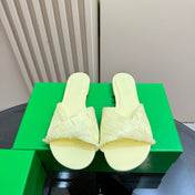 BLINK FLAT MULE IN PASTEL YELLOW INTRECCIATO LEATHER