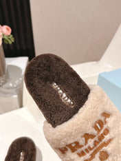 PRADA 25S FLAT MULES IN CREAM AND DARK BROWN RABBIT FUR