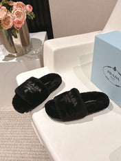 PRADA 25S FLAT MULES IN BLACK RABBIT FUR