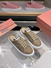 MIUMIU 26S SNEAKER MULES 45MM IN OLIVE GREEN MESH