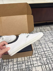 PRADA 26S LACE UP SNEAKERS IN WHITE CANVAS
