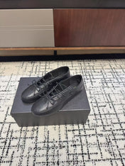MIUMIU 26S LACE UP BOW LOAFERS IN BLACK CALFSKIN