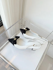 SLINGBACKS 65 MM IN WHITE CALFSKIN AND BLACK CANVAS