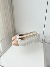 CHANEL 26S BALLET FLATS IN WHITE CALFSKIN WITH BEIGE TOE CAP AND BOW
