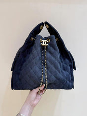 CC 25 HANDBAG 40 IN DARK BLUE DENIM GOLD HARDWARE