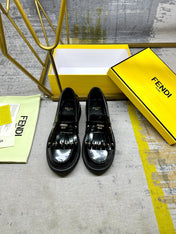 FENDI BAGUETTE LOAFERS IN BLACK CALFSKIN WITH GOLD HARDWARE