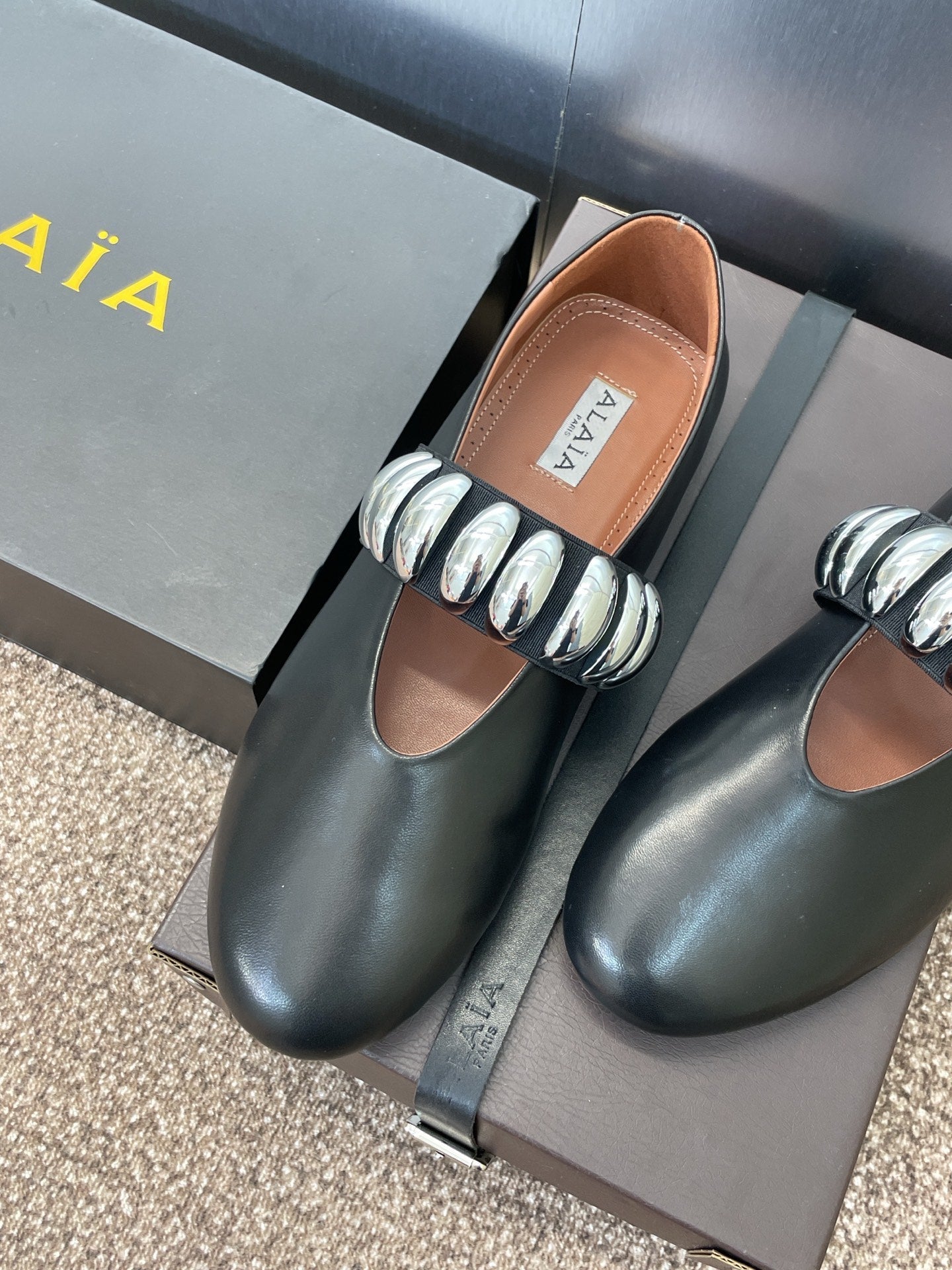 ALAIA MARY JANE FLATS 25S IN BLACK CALFSKIN WITH SILVER HARDWARE