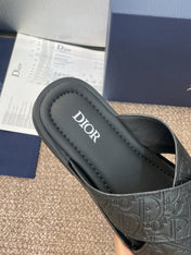 DIOR 25S ALIAS CROSS-STRAP SLIDES IN BLACK CALFSKIN