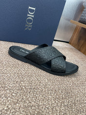 DIOR 25S ALIAS CROSS-STRAP SLIDES IN BLACK CALFSKIN