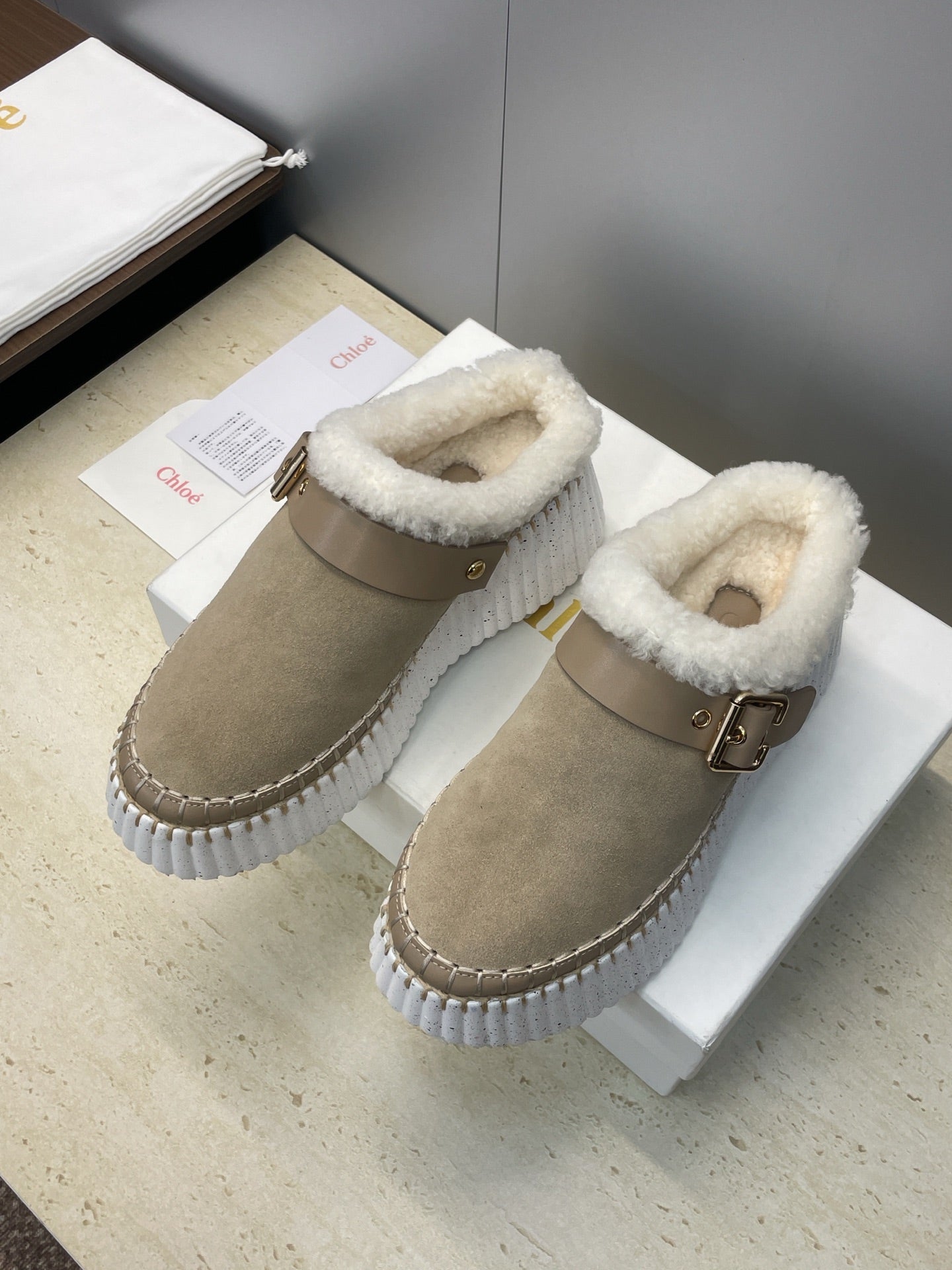CHLOÉ 26S FUR-LINED WEDGE MULES IN DARK BEIGE SUEDE