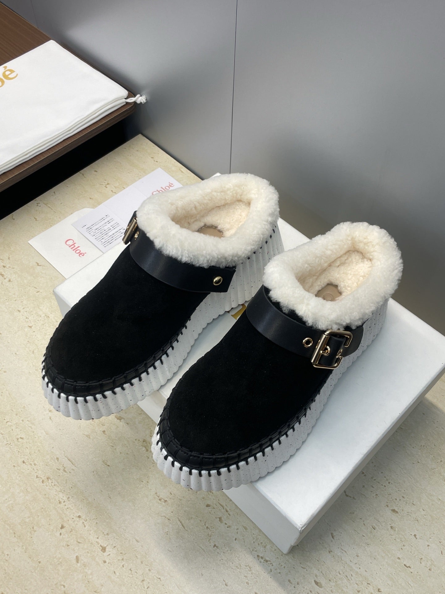 CHLOÉ 26S FUR-LINED WEDGE MULES IN BLACK SUEDE