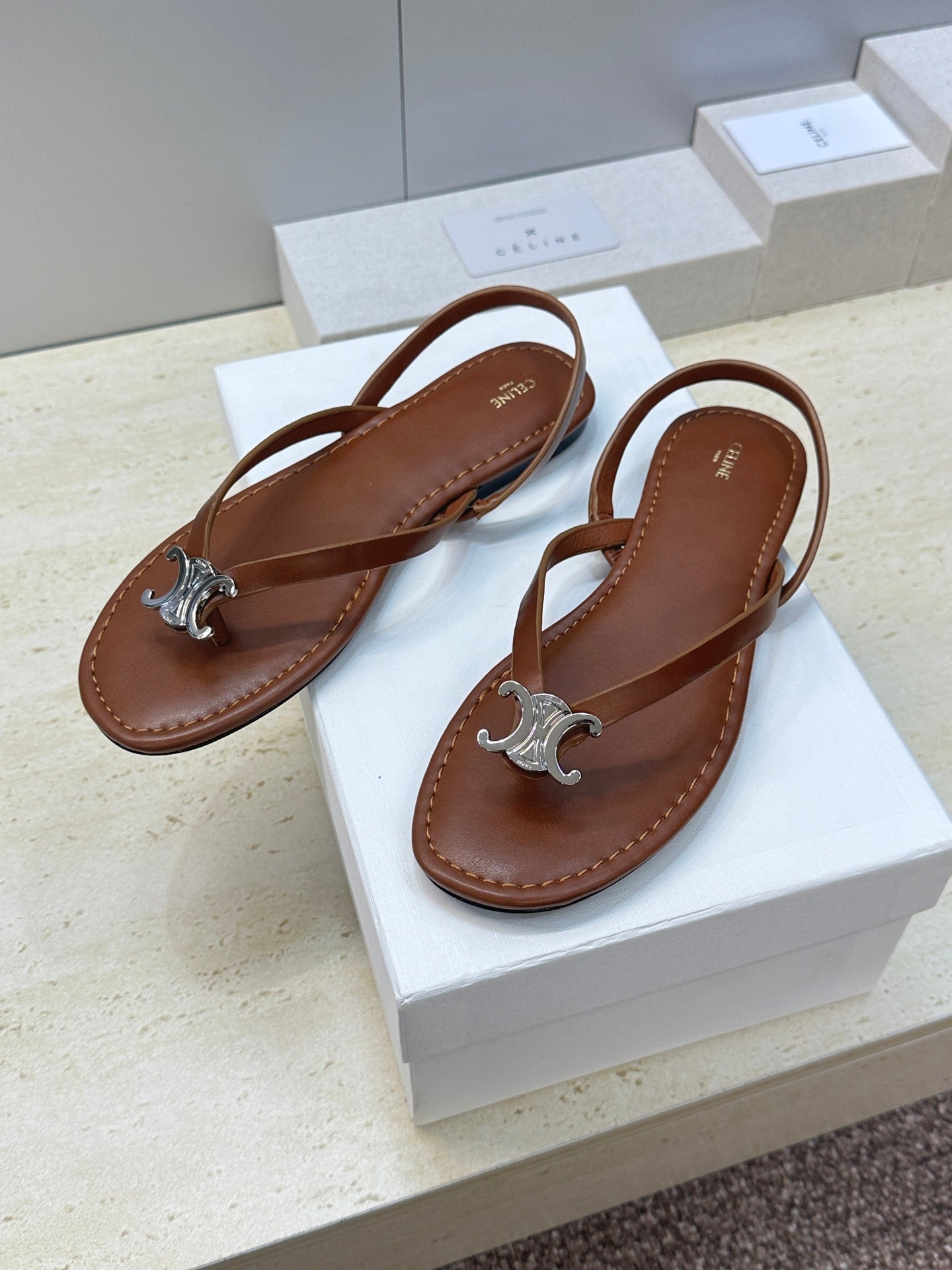 CELINE 26S THONG SANDALS IN BROWN CALFSKIN