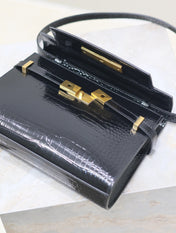 MANHATTAN SMALL 24 IN BLACK CROCODILE PATTERN GLOSSY CALFSKIN GOLD BUCKLE