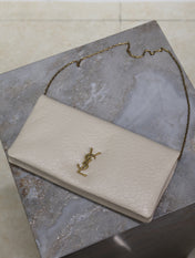 CALYPSO POUCH 24 IN WHITE ELEPHANT TEXTURED LAMBSKIN GOLD LOGO