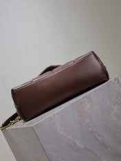 YSL 25S LOULOU PUFFER MM 29 IN DARK BROWN CALFSKIN GOLD HARDWARE