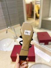 VALENTINO 26S ROCKSTUD CAGED SANDALS IN BLACK PATENT CALFSKIN