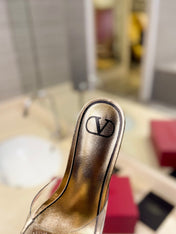 HIGH MULE 60MM IN GOLD SHEEPSKIN AND TRANSPARENT PVC