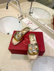 VALENTINO 26S SLIDES IN GOLD CALFSKIN WITH LOGO