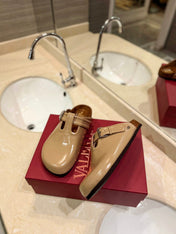 VALENTINO 26S FLAT MULES IN BEIGE PATENT CALFSKIN
