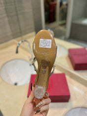 ROCKSTUD MULE SANDALS IN LIGHT PINK CALFSKIN AND TRANSPARENT PVC FILM