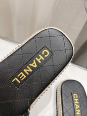 WOVEN STRAP SLIPPERS IN BLACK LAMBSKIN