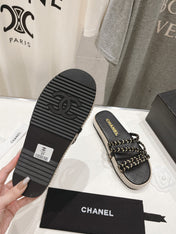 WOVEN STRAP SLIPPERS IN BLACK LAMBSKIN