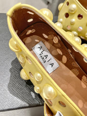 ALAIA PEARL MARY JANE SHOES IN YELLOW CORN LAMBSKIN