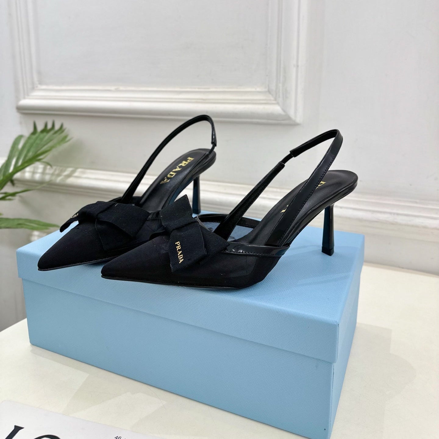 PRADA 26S POINTED-TOE SLINGBACK HEELS 75MM IN BLACK MESH WITH BLACK BOW