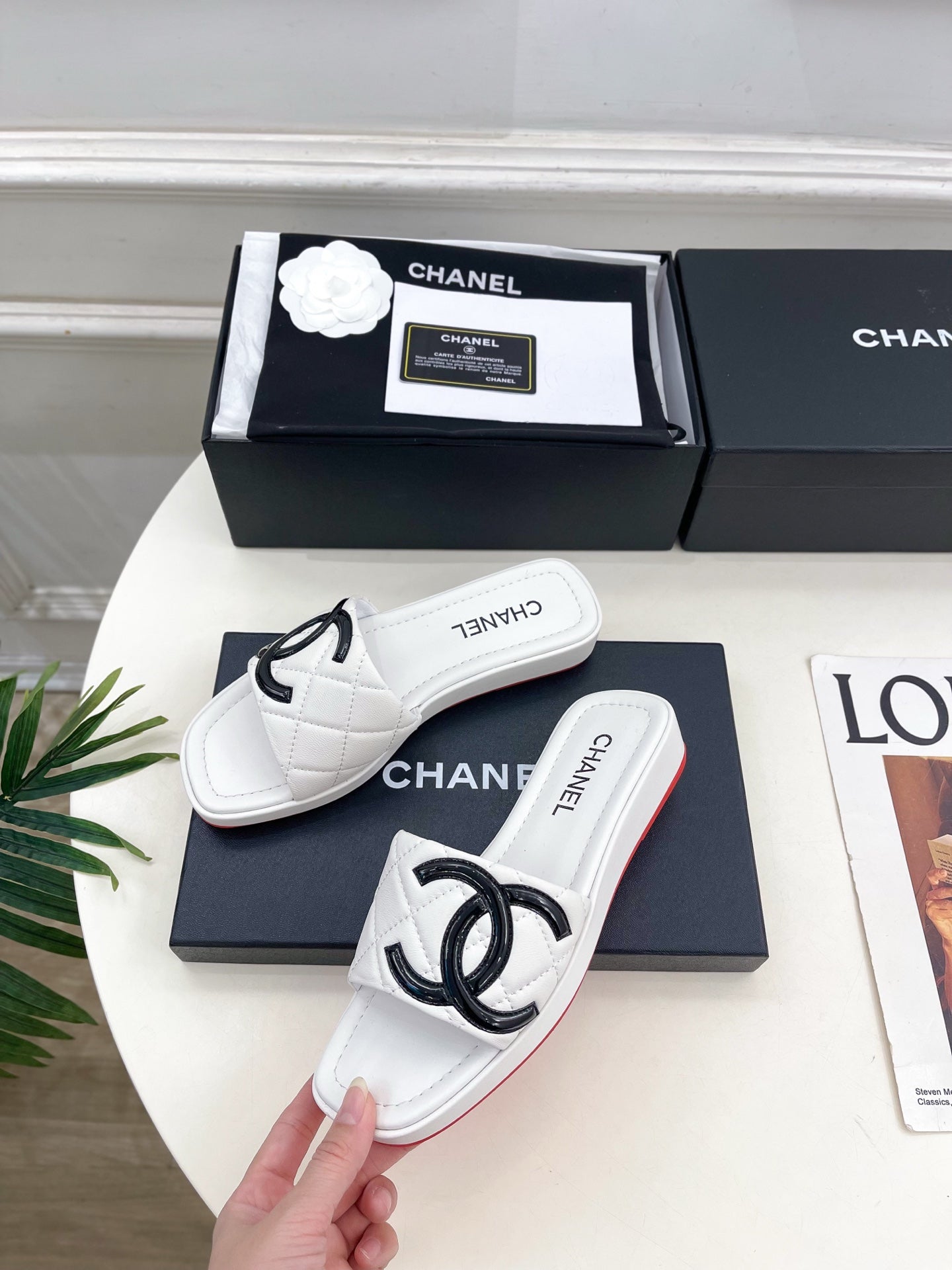 CHANEL 26S FLAT SLIDES IN WHITE LAMBSKIN WITH BLACK CC LOGO