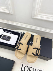 CHANEL 26S FLAT SLIDES IN BEIGE LAMBSKIN WITH BLACK CC LOGO